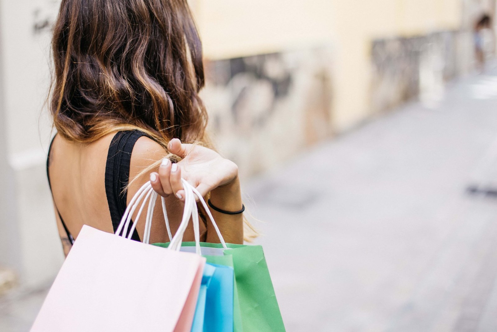 woman holding shopping bags